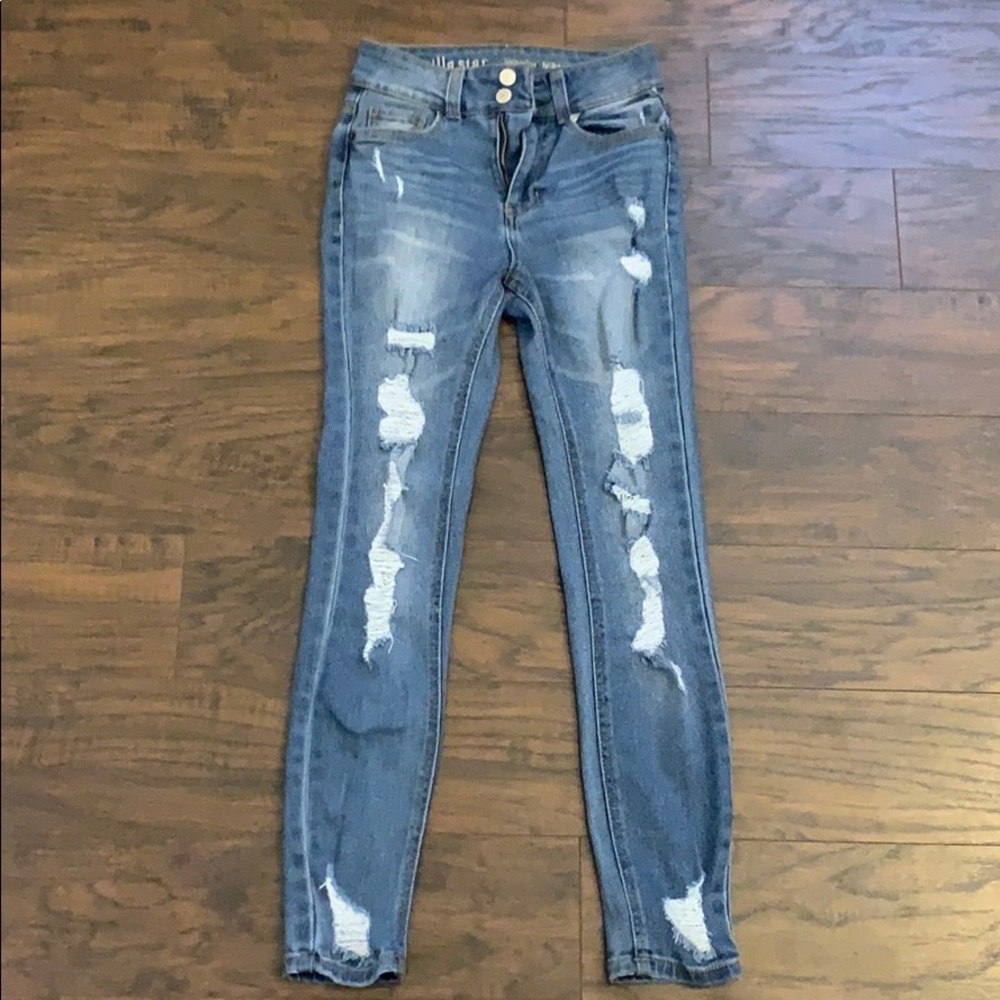 Distressed high rise medium wash jeans